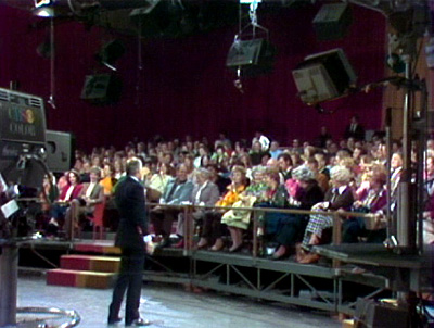 tv producer norman lear addresses a studio audience at a taping of all in the family