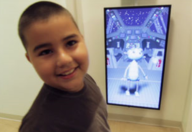 photos of a child playing a kinect for windows game