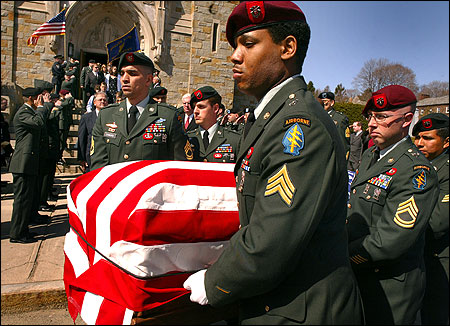 more than 850 mourners attended the funeral yesterday of army captain david scott connolly, who died in afghanistan. above, army airborne soldiers served as pallbearers.