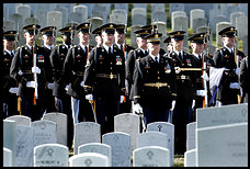 a procession arrives for the arlington funeral of army capt. joel e. cahill, killed nov. 6 in iraq.