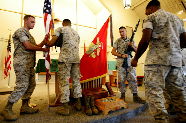 marines break down podium area following the memorial service for staff sgt. aaron j. taylor in the chapel at camp pendleton on october 28, 2009 in oceanside, california. staff sgt. taylor was killed while supporting combat operations in afghanistan.