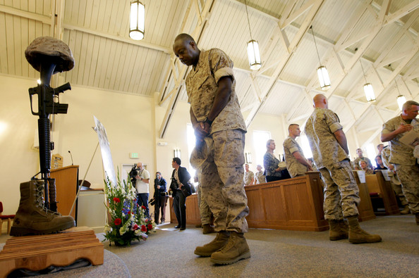 marines pay their respects during a memorial service for staff sgt. aaron j. taylor in the chapel at camp pendleton on october 28, 2009 in oceanside, california. staff sgt. taylor was killed while supporting combat operations in afghanistan.