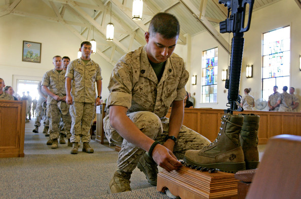 marines pay their respects during a memorial service for staff sgt. aaron j. taylor in the chapel at camp pendleton on october 28, 2009 in oceanside, california. staff sgt. taylor was killed while supporting combat operations in afghanistan.