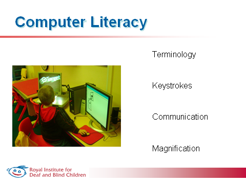 young boy draws on a pc using screen magnification, while viewing print material on a cctv.