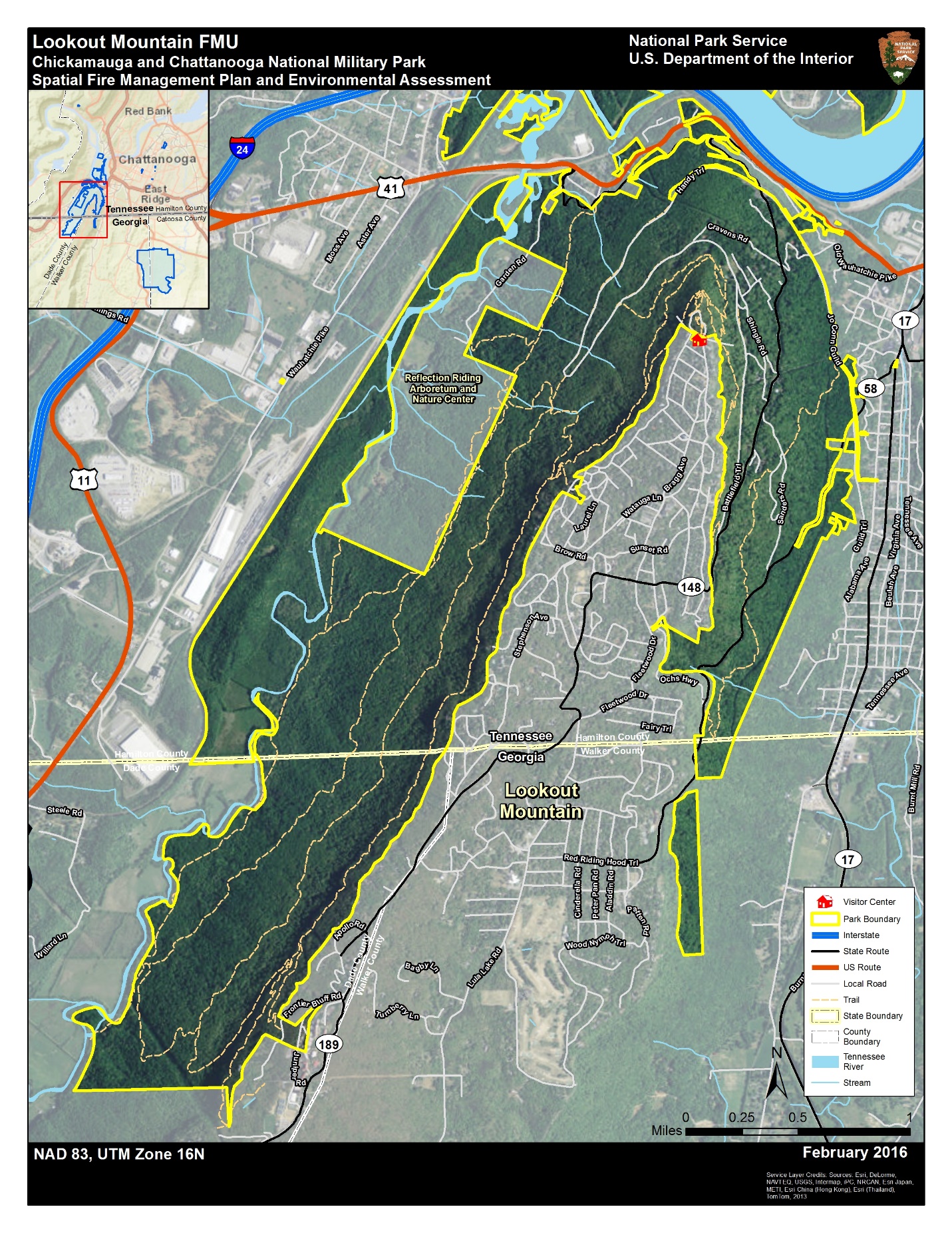 this map shows a zoomed-in view of the lookout mountain unit, with aerial photography as the base layer. the visitor center is located in the northern portion of the unit, with park lands surrounding the residential community of lookout mountain on three sides. the park unit has several trails and roads to access the park and adjacent private lands. the park unit crosses the tennessee-georgia stateline.