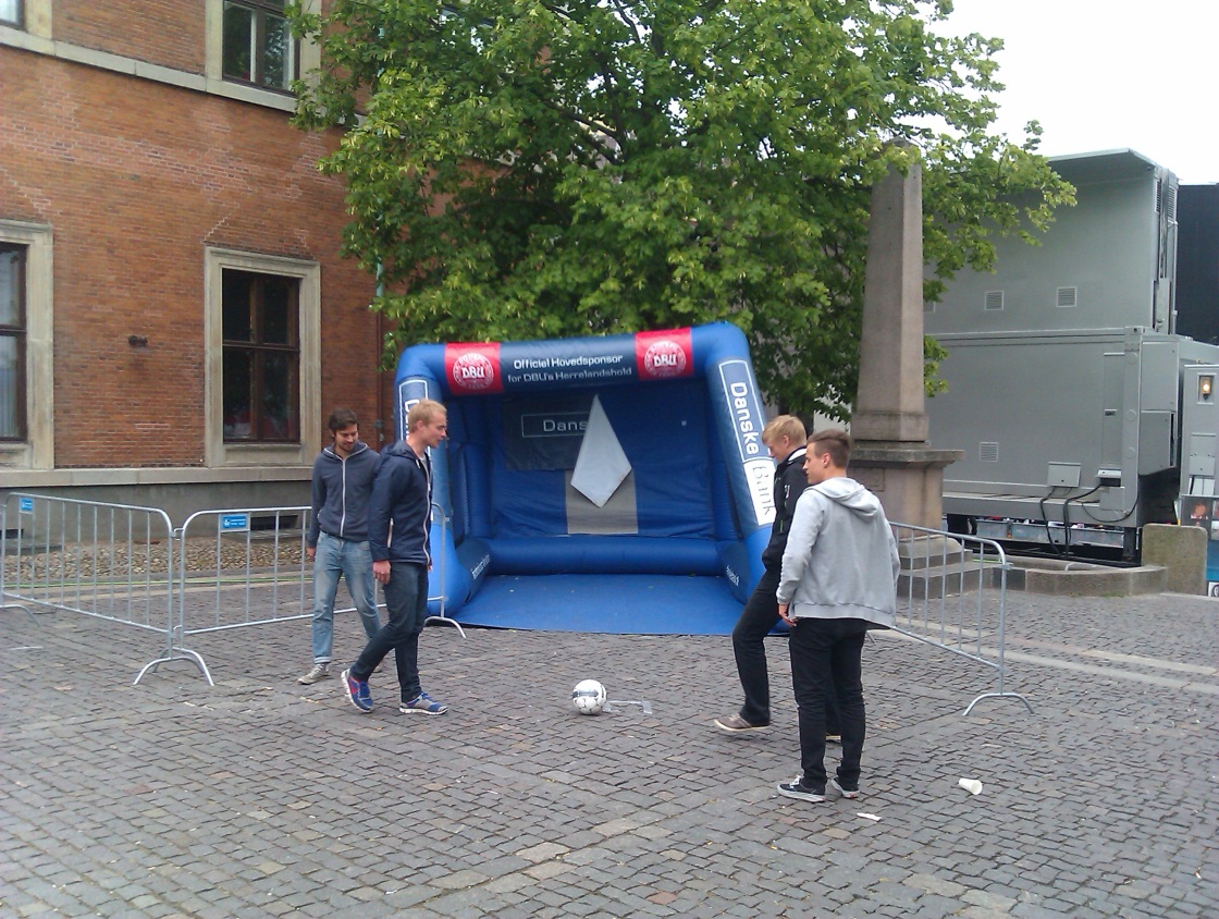 c:\users\tim\desktop\appendices\promotional images used in the first three interviews\danske bank promotional inflatable goal at a public viewing.jpg