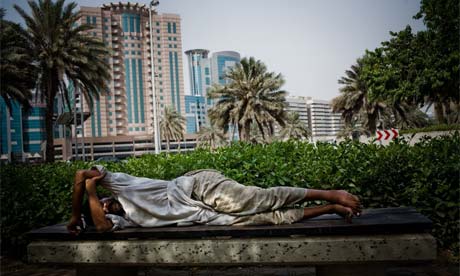 workers sleep on the street in dubai