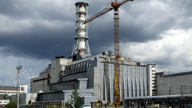 the concrete sarcophagus which surrounds chernobyl nuclear power plant.