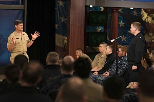  chief of naval personnel (cnp) vice adm. bill moran talks to sailors during a world-wide all-hands call.