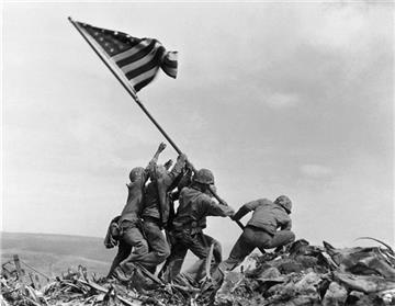 (ap photo/joe rosenthal, file). file - in this feb. 23, 1945 file photo, u.s. marines of the 28th regiment, 5th division, raise a u.s. flag atop mount suribachi, iwo jima. strategically located 660 miles from tokyo, the pacific island became the site o...