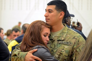 soldier hugging his wife