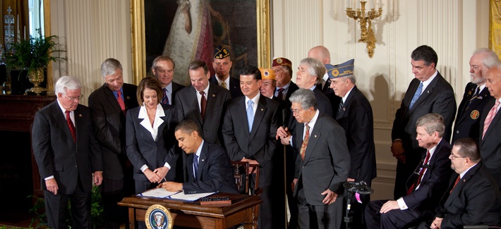 president obama and congressional leaders signing the veterans health care budget reform and transparency act