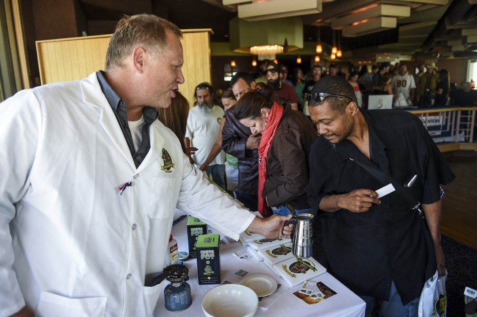 photo - extracting innovations coo seth cox shows navy veteran hikima nukes how to make active butter for edibles at the grow 4 vets cannabis giveaway at the doubletree hotel saturday, september 27, 2014. veterans who rsvped for the event were given gift bags with cannabis seeds, infused candy bars and a cannabis tincture. michael ciaglo, the gazette