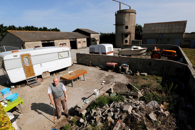 farmer raymond bertot, who was 19 when allied troops came ashore in 1944, poses on his property near the former d-day landing zone of utah beach in les dunes de varreville, france