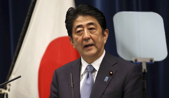 japanese prime minister shinzo abe delivers a statement to mark the 70th anniversary of the end of world war ii during a press conference at his official residence in tokyo friday, aug. 14, 2015. abe has expressed "profound grief" for all who perished in world war ii in a statement marking the 70th anniversary of the country's surrender. (ap photo/eugene hoshiko)
