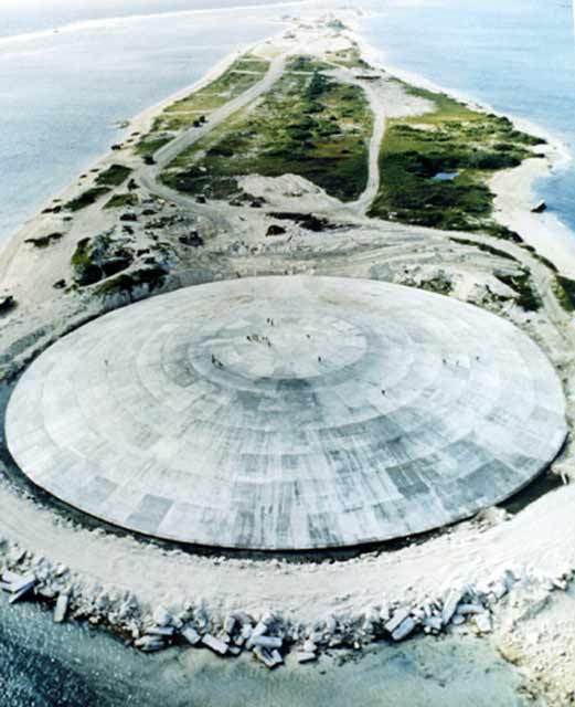 underneath the concrete dome on runit island, which is part of enewetak atoll, lies an estimated 73,000 cubic meters of radioactive soil and debris generated during the cold war testing of nuclear bombs in the south pacific. the american government spent nearly $240 million and used about 4,000 men in the 1970s to build and fill the cactus crater.