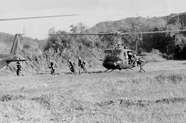 description ia drang infantry disembarking from helicopter.jpg