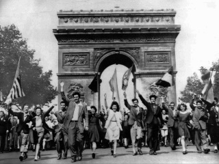 parisians march through the arc de triomphe jubilantly