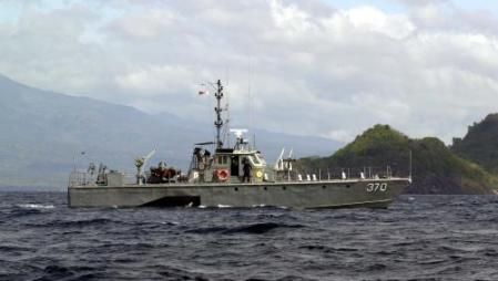 a philippines navy patrol boat continues a 24-hour search and rescue mission.