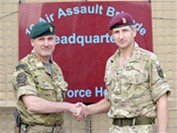 brigadier james chiswell (right) of 16 air assault brigade hands over command of task force helmand to brigadier ed davis rm of 3 commando brigade in lashkar gah [picture: sergeant russ nolan, crown copyright/mod 2011] 