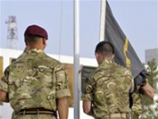 the flag of 3 commando brigade is raised in lashkar gah to mark the transfer of authority of task force helmand from 16 air assault brigade [picture: sergeant russ nolan, crown copyright/mod 2011] 