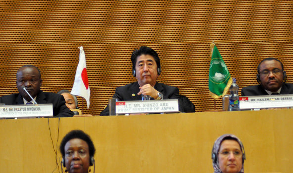 rime minister shinzo abe of japan sits between ethiopia\'s prime minister, hailemariam desalegn, right, and the deputy chairman of the african union commission, erastus mwencha, during a visit to the african union headquarters in addis ababa, ethiopia, on jan. 14.