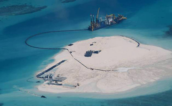  philippine surveillance photo shows an island that china has created on a reef among the disputed spratly islands in the south china sea.
