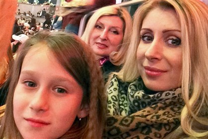 milakogosodysseys mila kogos (middle) at a penguins game with her granddaughter anna (left) and daughter, alona (right).