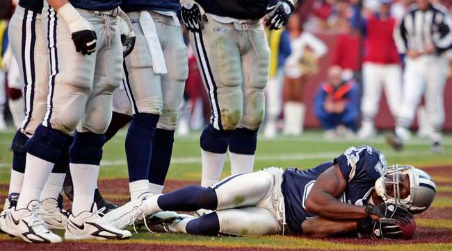 after scoring a touchdown, terrell owens pretends to nap with the football during a cowboys game in november 2006. now sleeping has become part of the job.